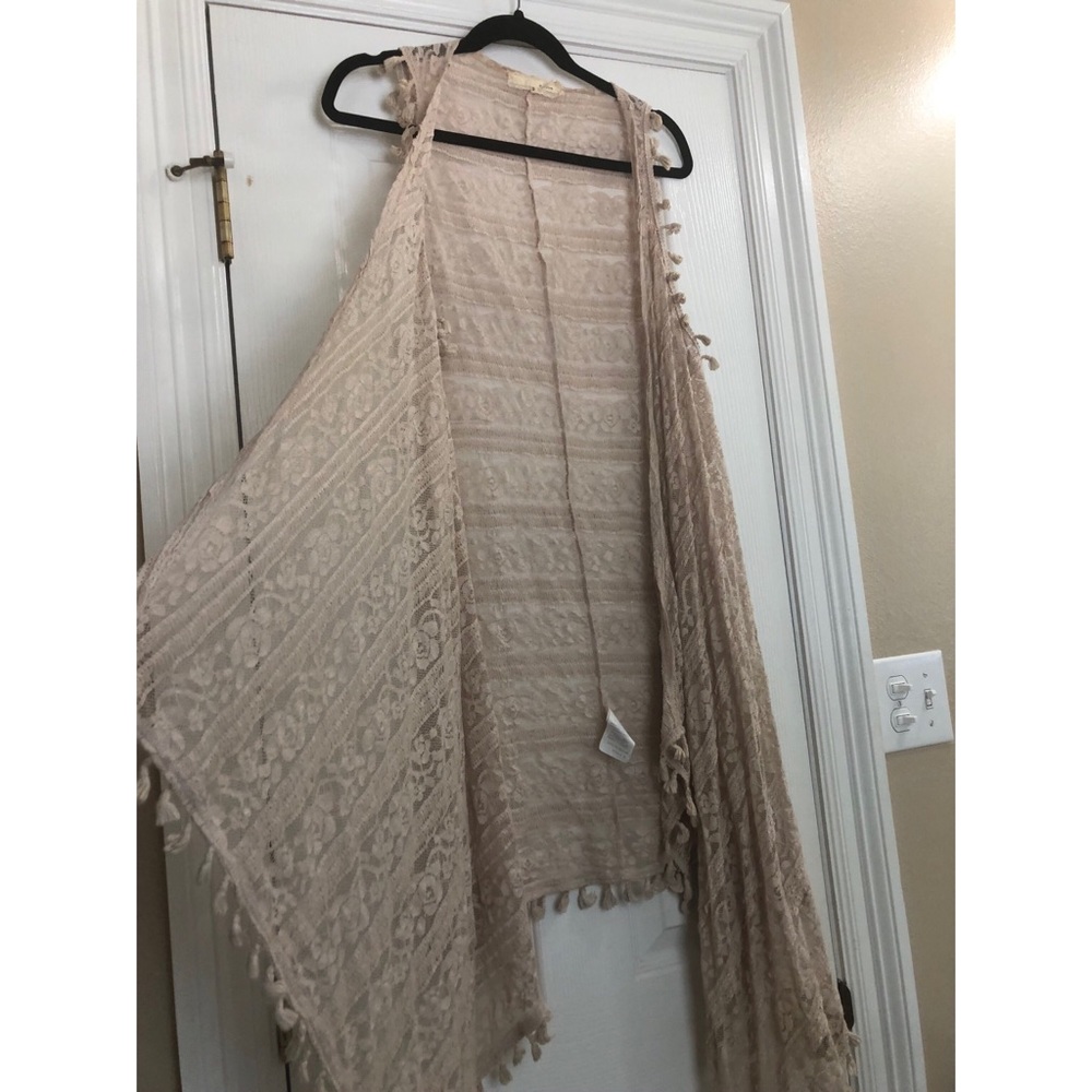 Sleeveless tan lace cardigan:)
